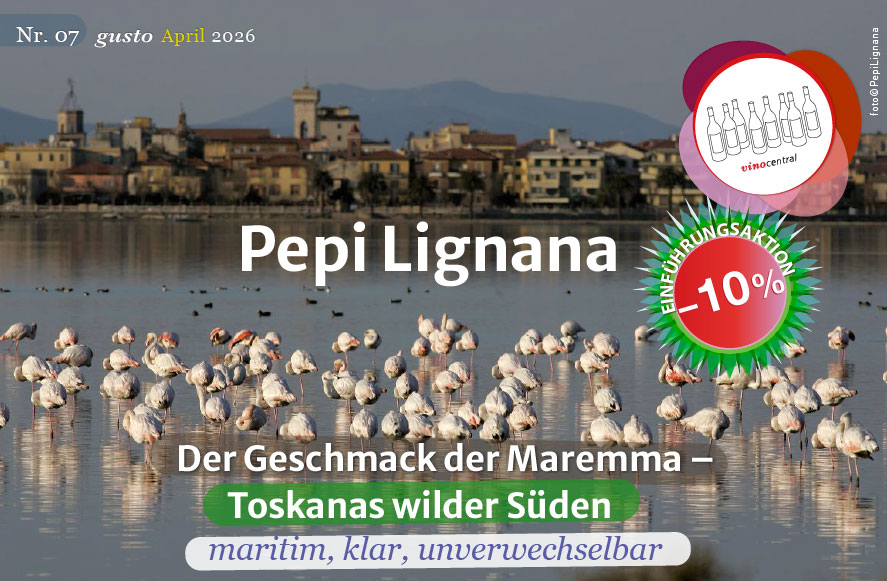 Ein Foto mit Blick auf eine Lagune in Maremma mit Flamingos im Wasser
